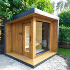 Relaxing - type wet - insulated electrically - heated sauna. It's a traditional outdoor cube - shaped sauna made of red cedar for 6 people. The wooden sauna comes with a heater.