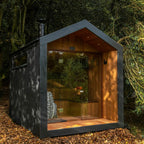 4 - person modern outdoor dry - steam sauna room. It features a square cube design and is made of red cedar, spruce, and hemlock. It is electrically powered.