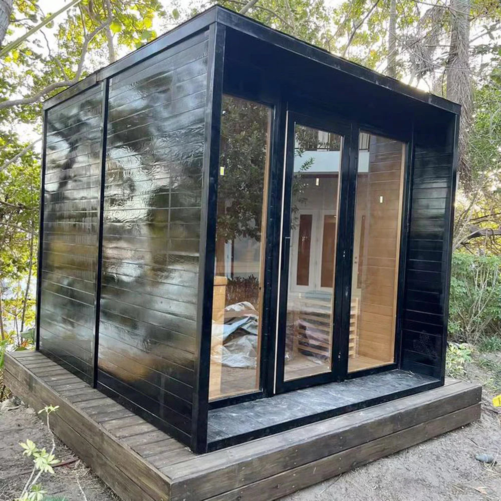 Modern - designed outdoor cube - shaped sauna room. It is a wooden dry - steam sauna room equipped with an electric furnace and can accommodate 4 people. 主圖