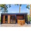 Custom - size high - quality cedar sauna room with red cedar glass windows. It features a modern design and has a large - sized bathtub space outdoors.